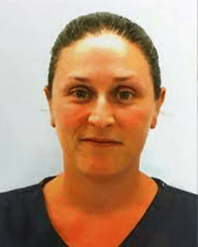 Headshot of Dr. Leah Limone, wearing a dark top, with hair tied back.