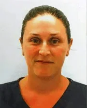 Headshot of Dr. Leah Limone, wearing a dark top, with hair tied back.